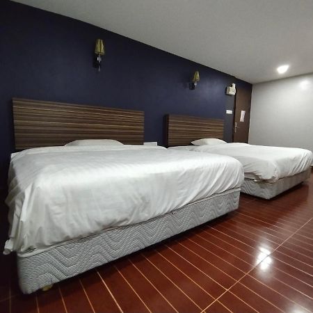 Oyo 90248 Kapitan Inn บินตูลู ภายนอก รูปภาพ