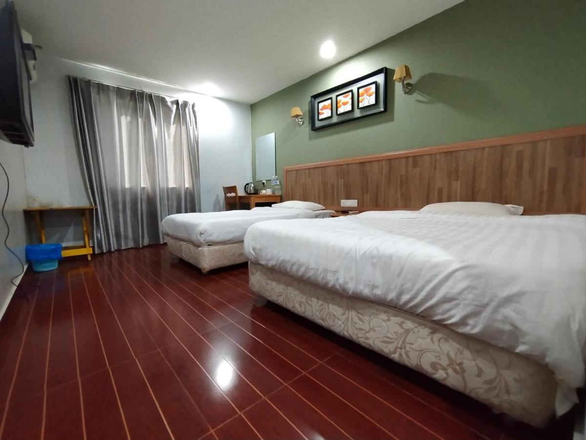 Oyo 90248 Kapitan Inn บินตูลู ภายนอก รูปภาพ
