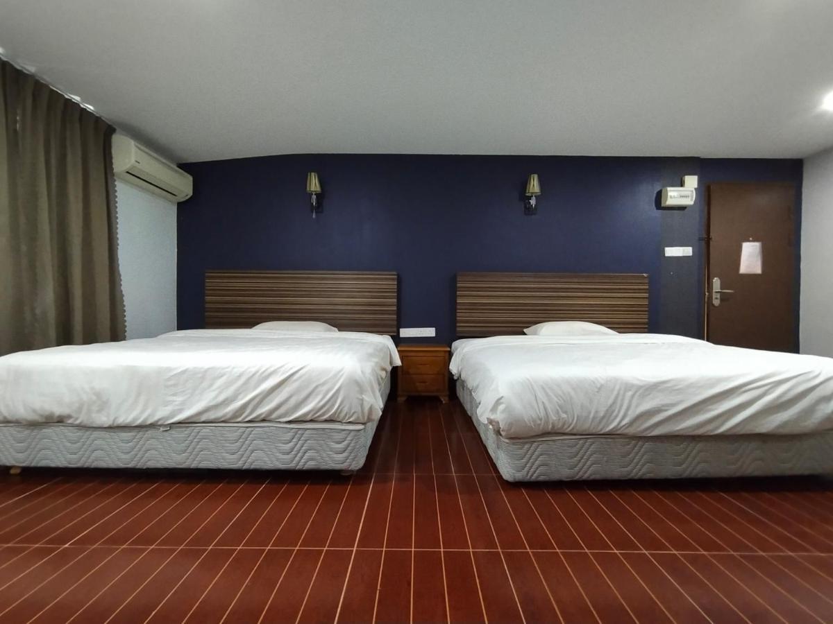 Oyo 90248 Kapitan Inn บินตูลู ภายนอก รูปภาพ